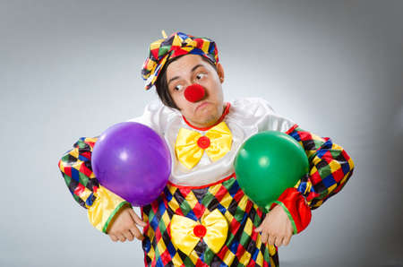 Clown with balloons in funny conceptの写真素材