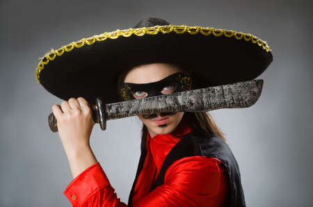 Person wearing sombrero hat in funny conceptの写真素材