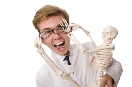 Funny doctor with skeleton isolated on whiteの写真素材