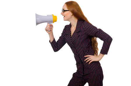Young businesswoman with loudspeaker on whiteの写真素材