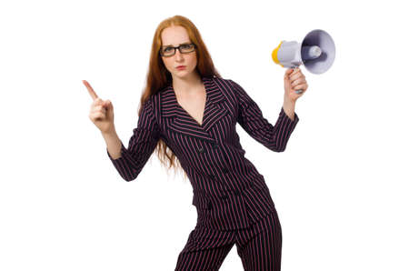 Young businesswoman with loudspeaker on whiteの写真素材