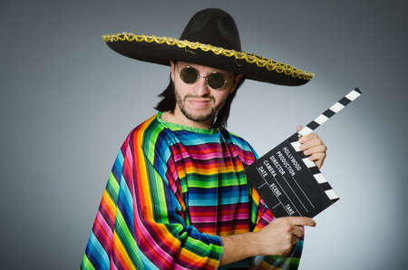 Mexican man with movie boardの写真素材