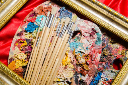 Art concept with palette and brushesの写真素材