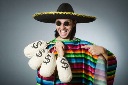 Mexican man with money sacksの写真素材