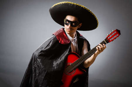 Person wearing sombrero hat in funny conceptの写真素材