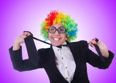Woman clown businesswoman isolated on whiteの写真素材