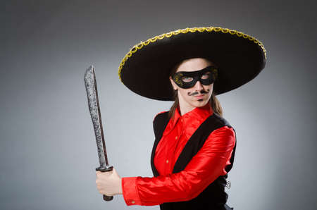 Person wearing sombrero hat in funny conceptの写真素材