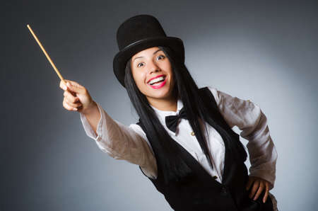 Woman magician in funny conceptの写真素材