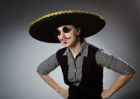 Person wearing sombrero hat in funny conceptの写真素材