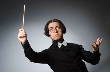 Funny conductor in musical conceptの写真素材