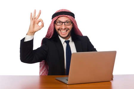 Arab businessman with computer on whiteの写真素材