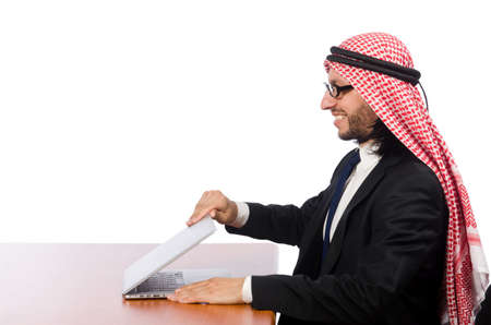 Arab businessman with computer on whiteの写真素材