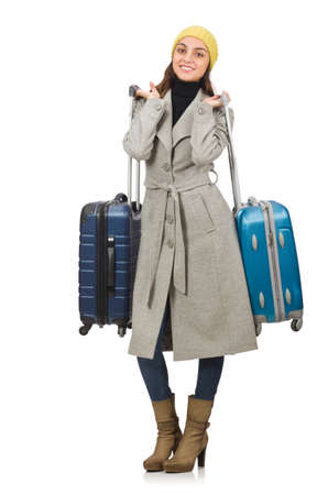 Woman with suitcase ready for winter vacationの写真素材