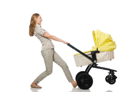 Woman with baby and pram isolated on whiteの写真素材
