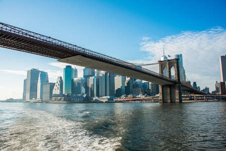 Brooklyn bridge in New York on bright summer dayの写真素材