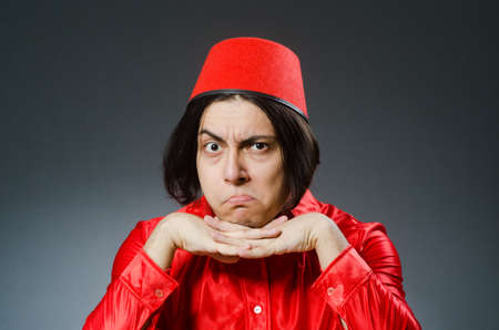 Man wearing red fez hatの写真素材