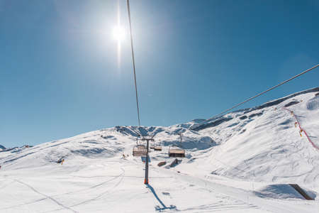 Ski lifts durings bright winter dayの写真素材