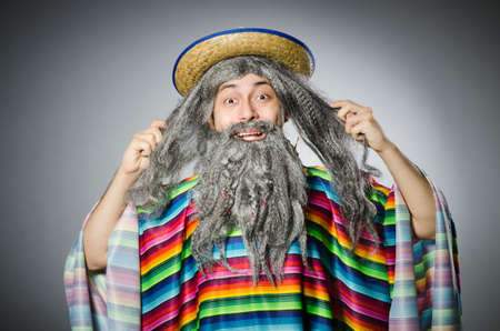 Person wearing sombrero hat in funny conceptの写真素材