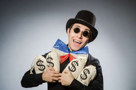 Funny man with money dollar sacksの写真素材