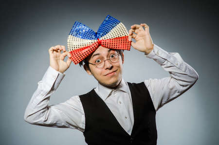 Funny man with giant bow tieの写真素材