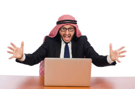 Arab businessman with computer on whiteの写真素材