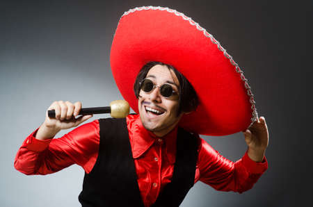 Person wearing sombrero hat in funny conceptの写真素材