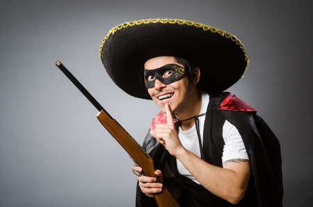 Person wearing sombrero hat in funny concept
