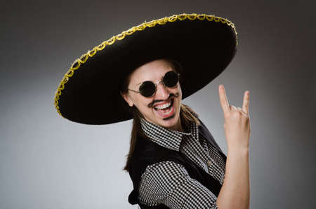 Person wearing sombrero hat in funny conceptの写真素材