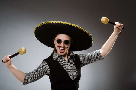 Person wearing sombrero hat in funny conceptの写真素材