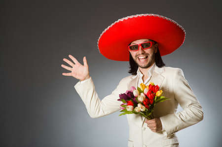 Person wearing sombrero hat in funny conceptの写真素材