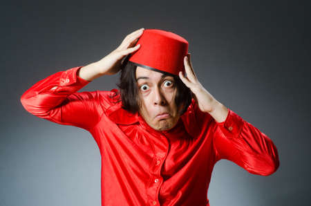 Man wearing red fez hatの写真素材
