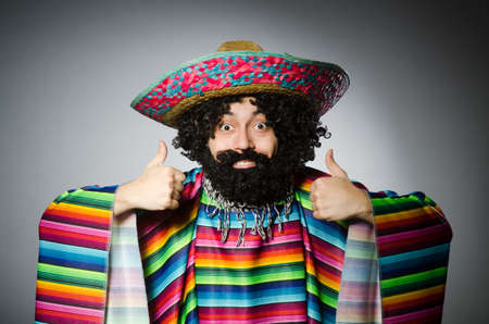 Person wearing sombrero hat in funny conceptの写真素材