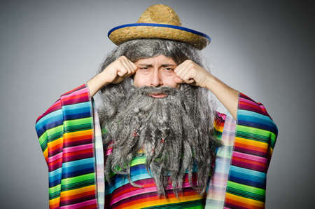 Person wearing sombrero hat in funny conceptの写真素材