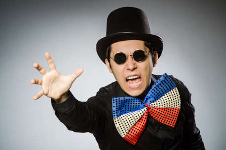 Funny man with sunglasses and vintage hatの写真素材