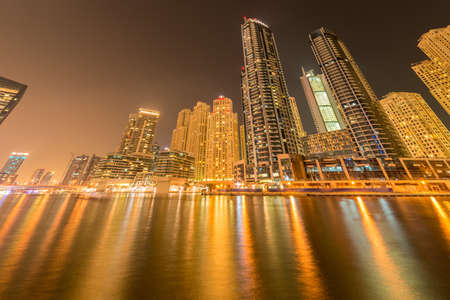 Dubai - AUGUST 9, 2014: Dubai Marina district on August 9 in UAE. Dubai is fastly developing city in Middle Eastのeditorial素材