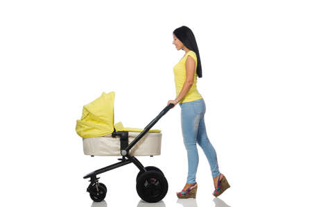 Woman with baby and pram isolated on white
