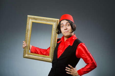 Man wearing red fez hatの写真素材