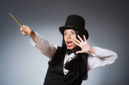 Woman magician in funny conceptの写真素材