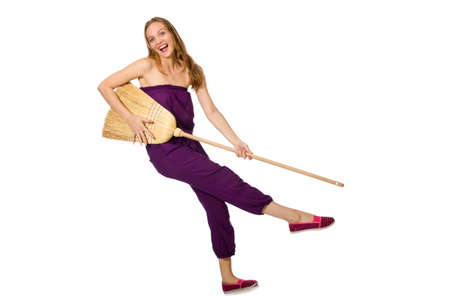 Housewife with broom isolated on whiteの写真素材