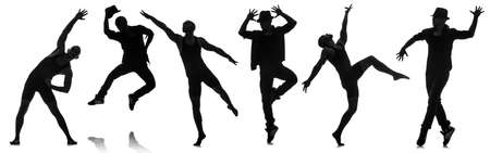 Silhouettes of dancers in dancing conceptの写真素材