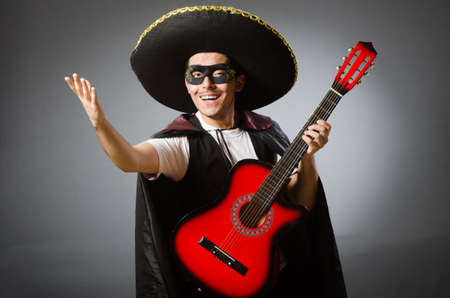 Person wearing sombrero hat in funny conceptの写真素材