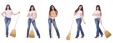 Woman with broom isolated on whiteの写真素材