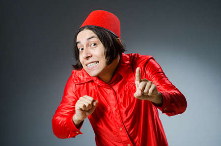 Man wearing red fez hatの写真素材