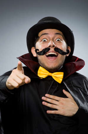 Funny magician man wearing tophatの写真素材