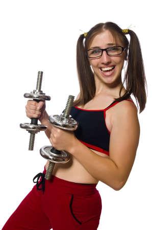 Woman exercising with dumbbells isolated on whiteの写真素材