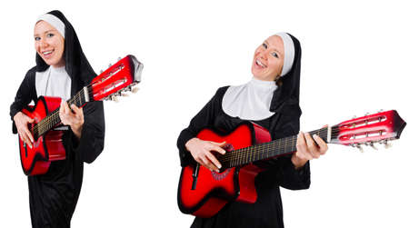 Nun with guitar isolated on whiteの写真素材