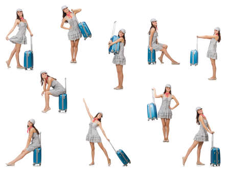 Travelling woman with suitcase isolated on whiteの写真素材