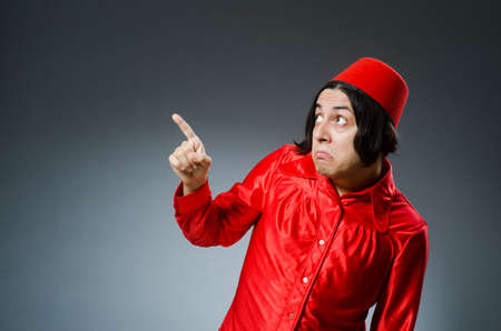 Man wearing red fez hatの写真素材