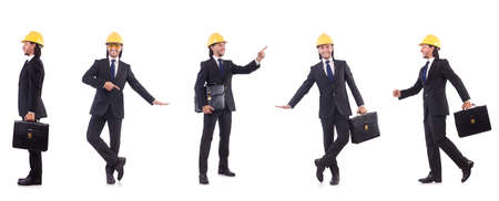 Young architect wearing hardhat on whiteの写真素材