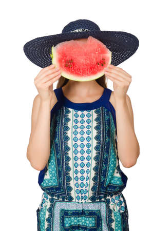 Woman eating watermelon isolated on whiteの写真素材